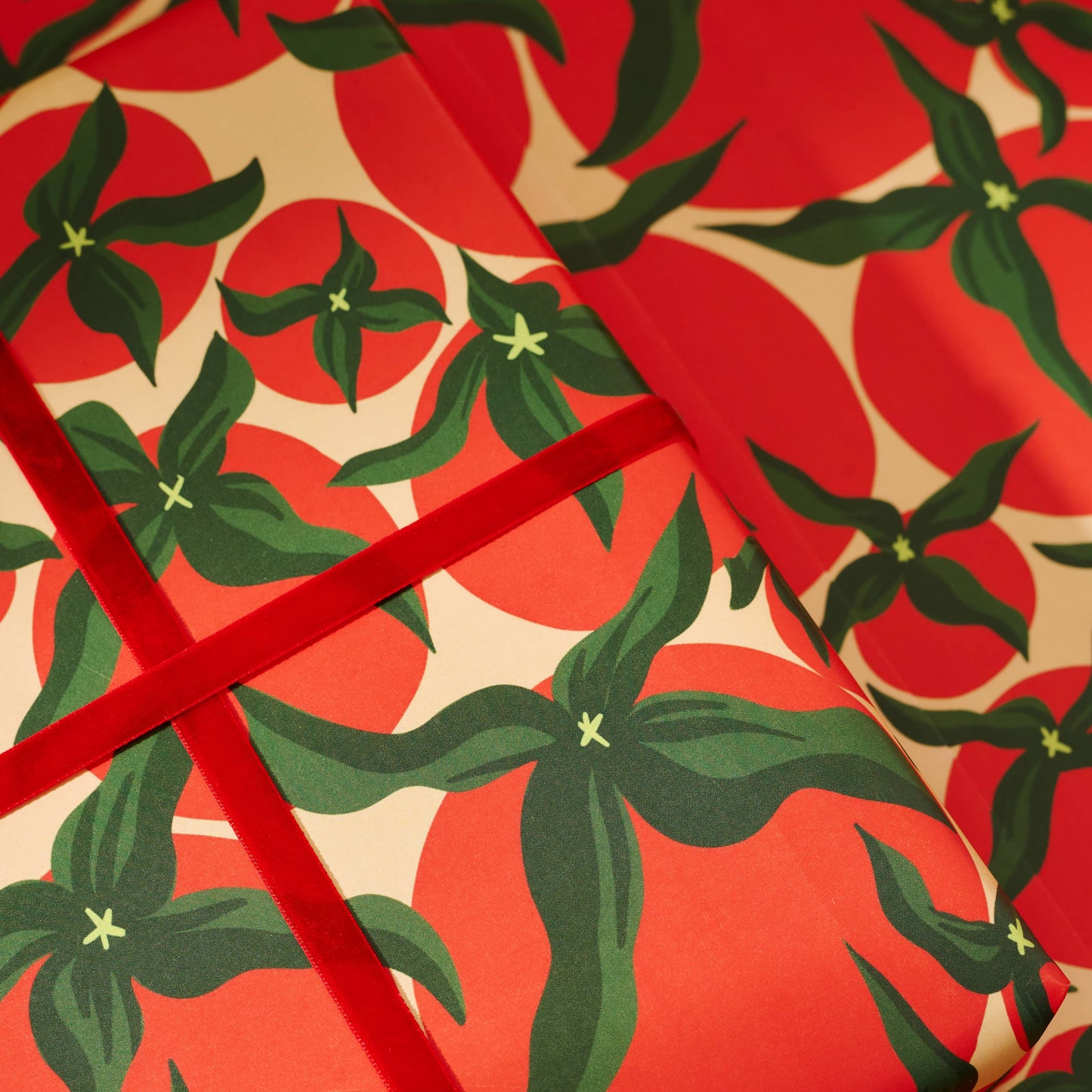 gift wrap paper with green leaf red tomato pattern 