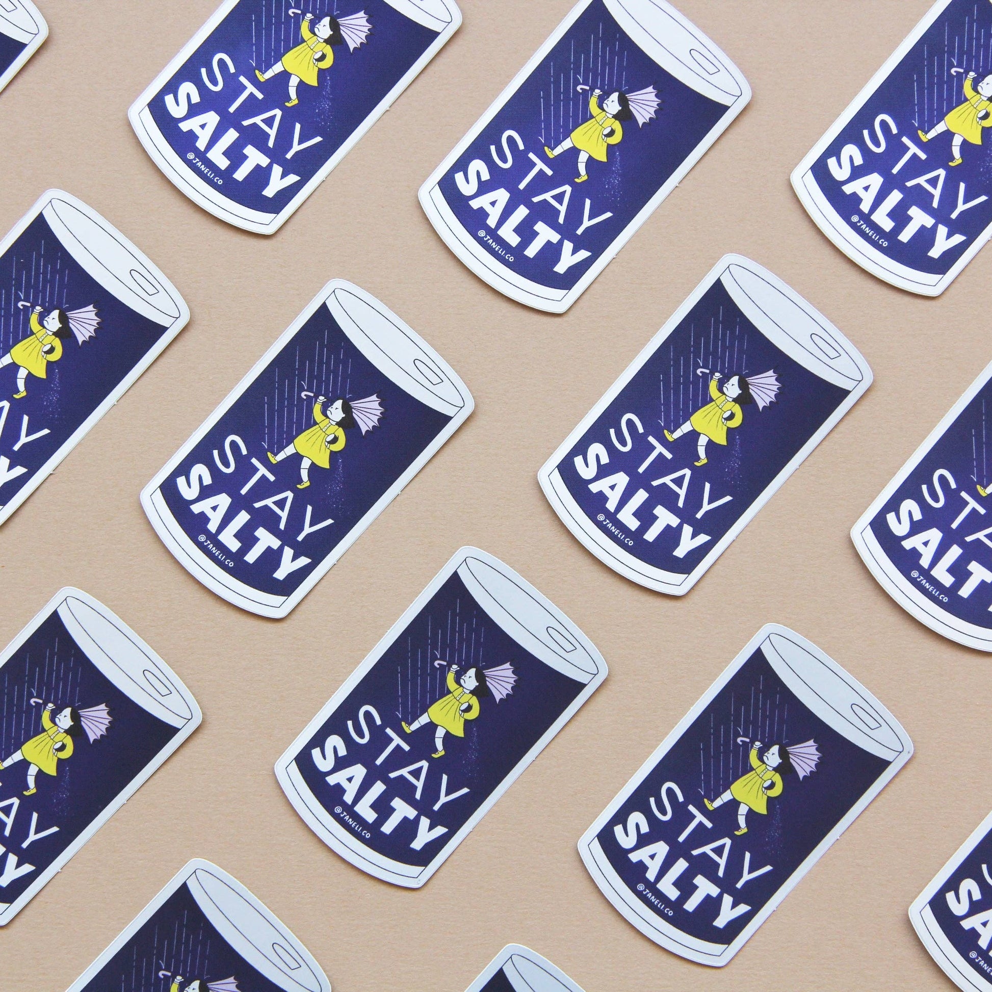 Pattern of 'Stay Salty' salt shaker stickers on a beige background