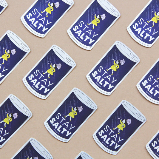 Pattern of 'Stay Salty' salt shaker stickers on a beige background
