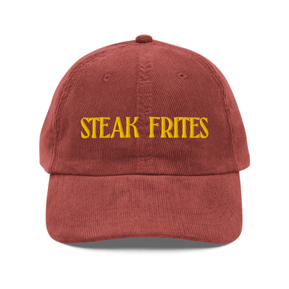 Red cap with 'STEAK FRITES' text on a transparent background