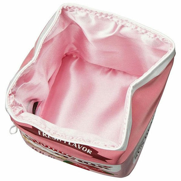 Pouch opened to reveal pink satin interior