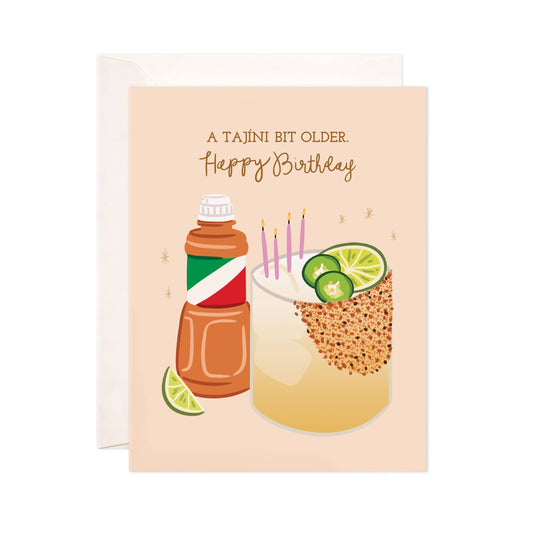 Birthday card with tajin bottle and a margarita with candles on a beige background