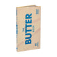 Beige book titled 'The Butter Book' with blue text on a white background