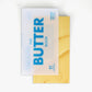 Book titled 'The Butter Book' with a yellow cover on a white background