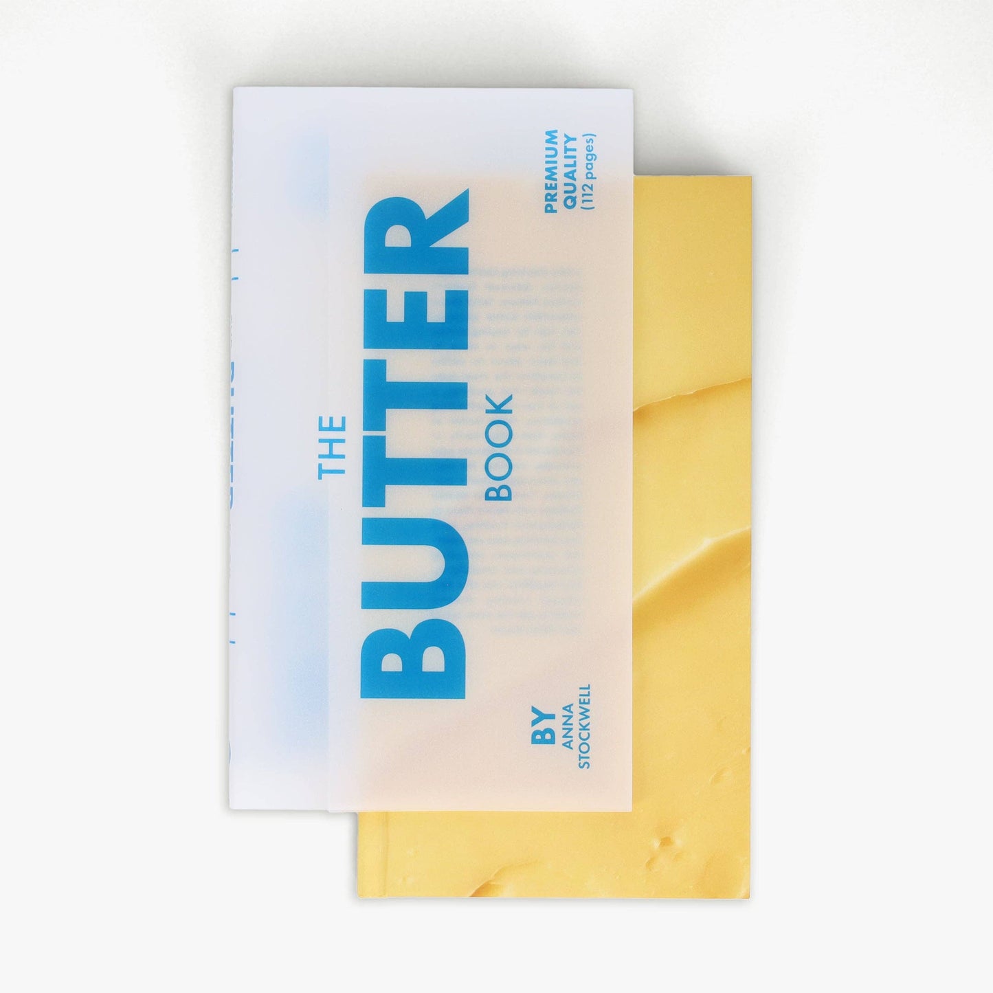 Book titled 'The Butter Book' with a yellow cover on a white background