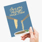 Card with noodles and text 'love you through thick and thin' held by a hand on a white background