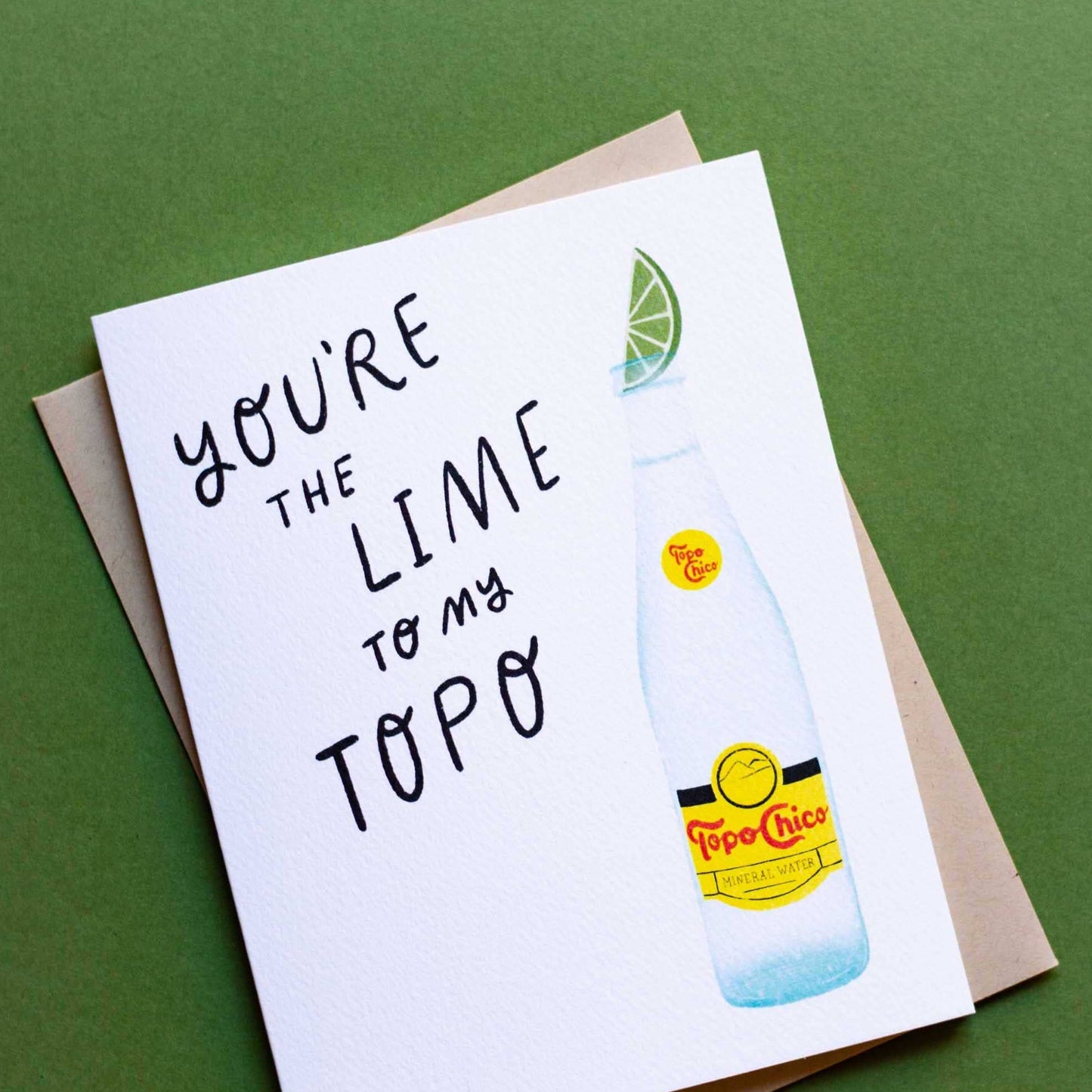 greeting card with illustration of a topo chico bottle with a lime slice on top. Text reads "You're the  lime to my topo" 