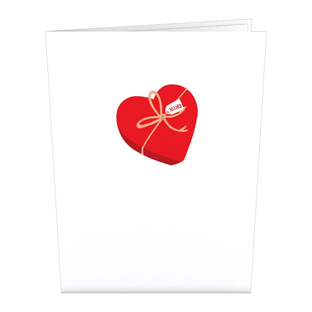 Front cover of the card to show an outside of a box of heart shaped chocolates. Presumably plain on the outside to releal an exciting interior.