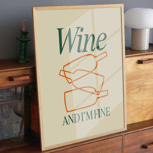 frame with a print that says: Wine and I'm fine. Outline of 3 wine bottles cascading down.