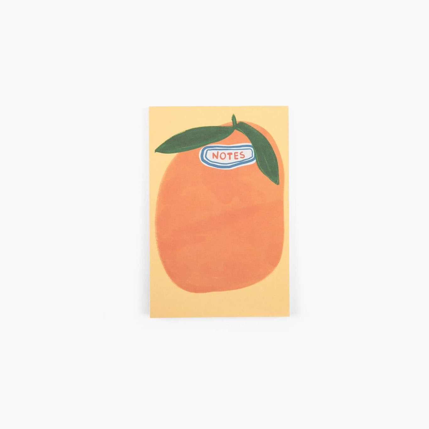 Notepad with peach design and 'NOTES' label on a white background