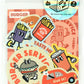Sticker pack with cartoon illustrations of a burger, fries, and soda. Clear ziplock packaging.