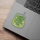 Laptop with a matcha green tea cup sticker on a wooden surface