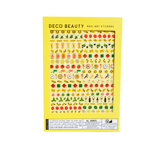 Sheet of Deco Beauty nail art stickers with various pasta theme designs on a yellow background