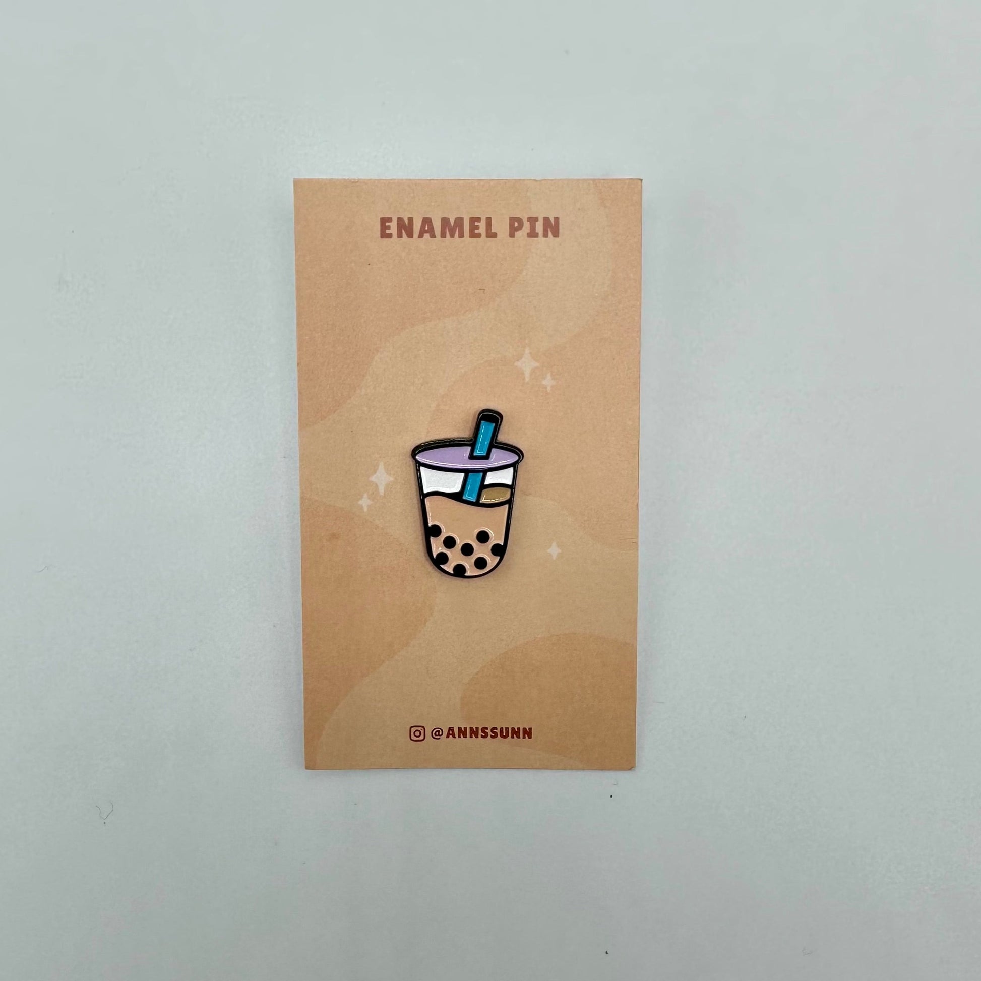 boba enamel pin by ann sun on card backing 