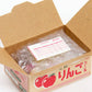 Cardboard box with bubble wrap and an invoice inside, featuring Japanese text and apple graphics.