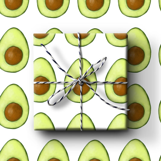 Gift box wrapped with avocado pattern wrapping paper on a white background