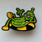 Green and yellow pickle cartoonish character on a white background