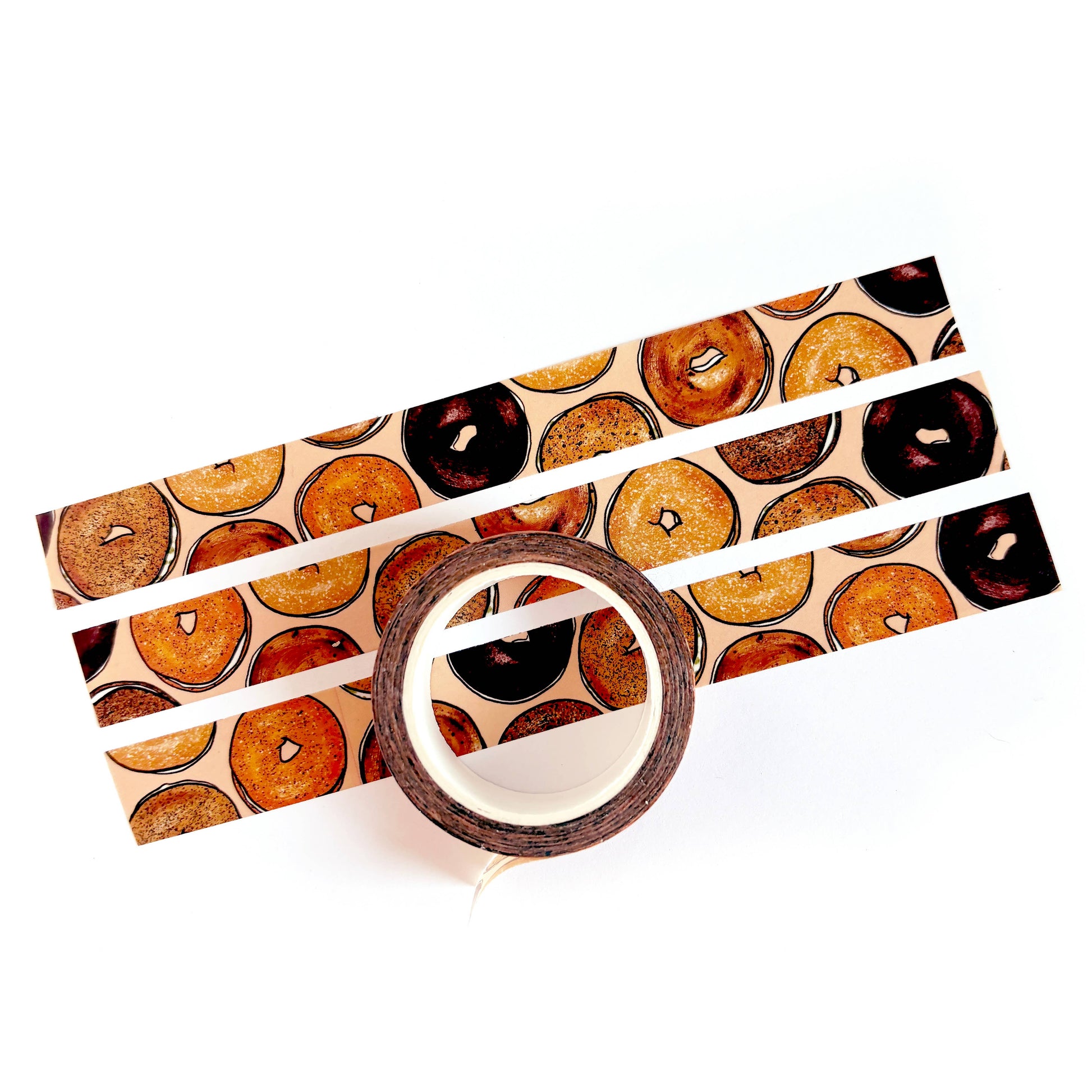 washi tape that features a repeating pattern of bagels and cream cheese