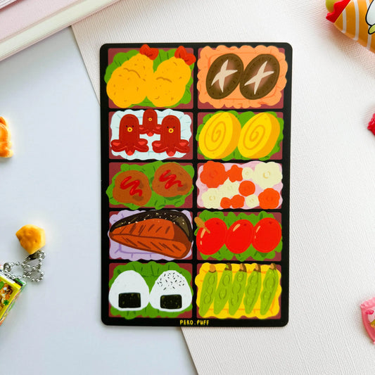 Sticker sheet with various Japanese food illustrations in a bento box on a white background