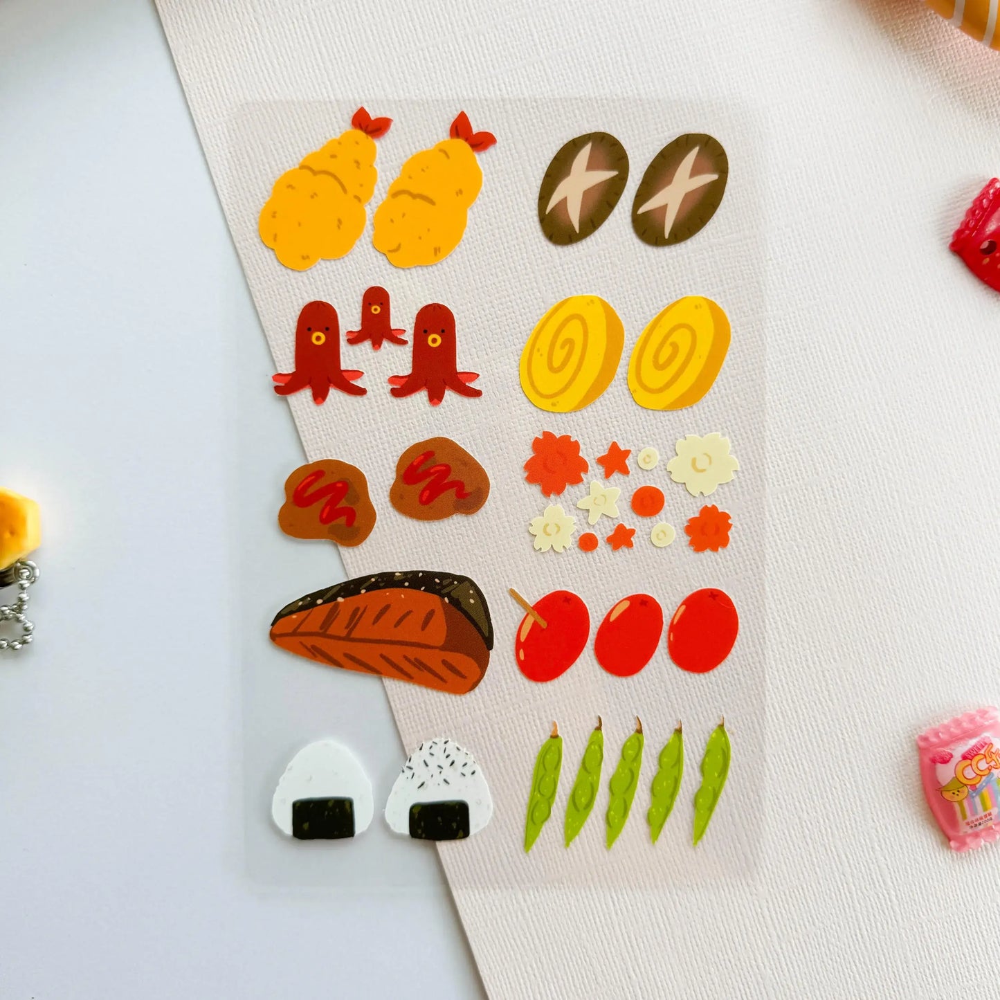Set of colorful Japanese food-themed stickers on a white background