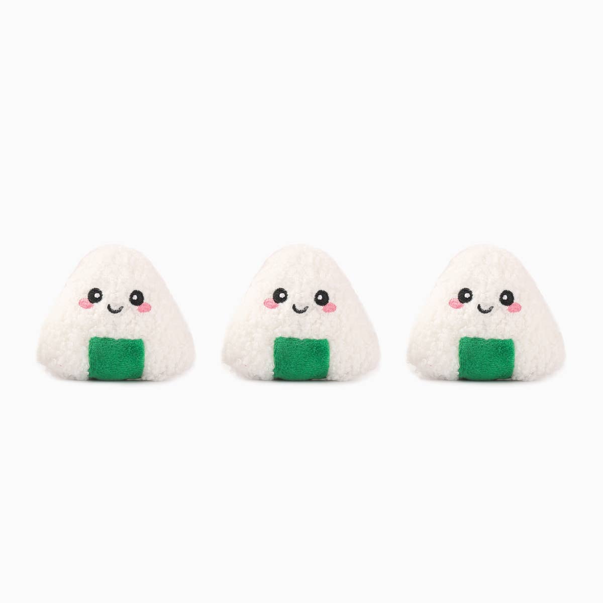 Three plush toys shaped like onigiri with smiling faces on a white background