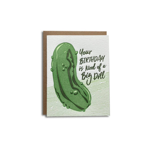 Greeting card with a large dill pickle on it with text that reads "Your birthday is kind of a big dill" 