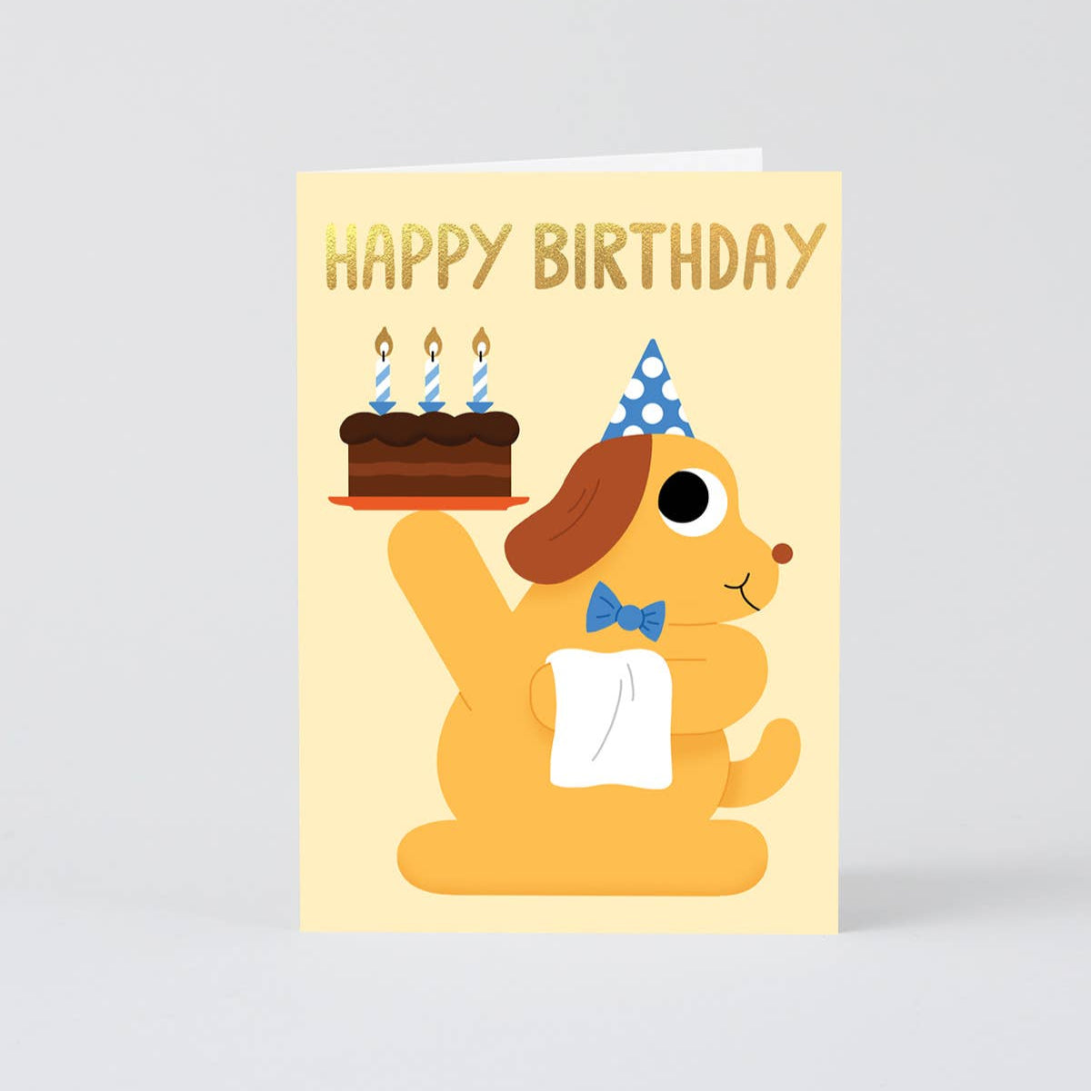 Birthday greeting card with a dog as a waiter, holdiing up a chocolate cake