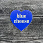 blue, heart-shaped sticker with text in center that says "blue cheese" 