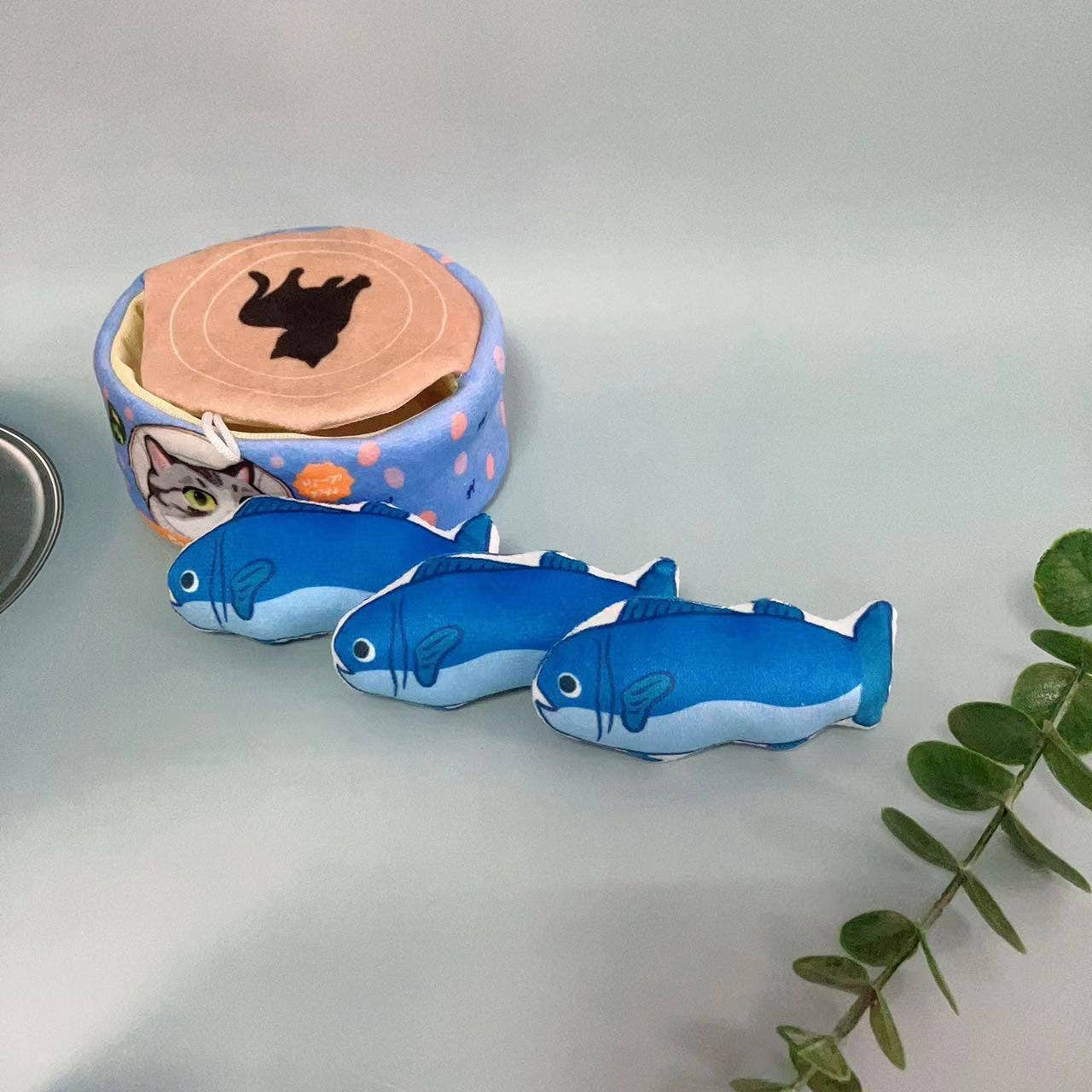 Blue fish can catnip toy with 3 individual fishes inside