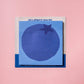 Blueberry sticky note on a pink background