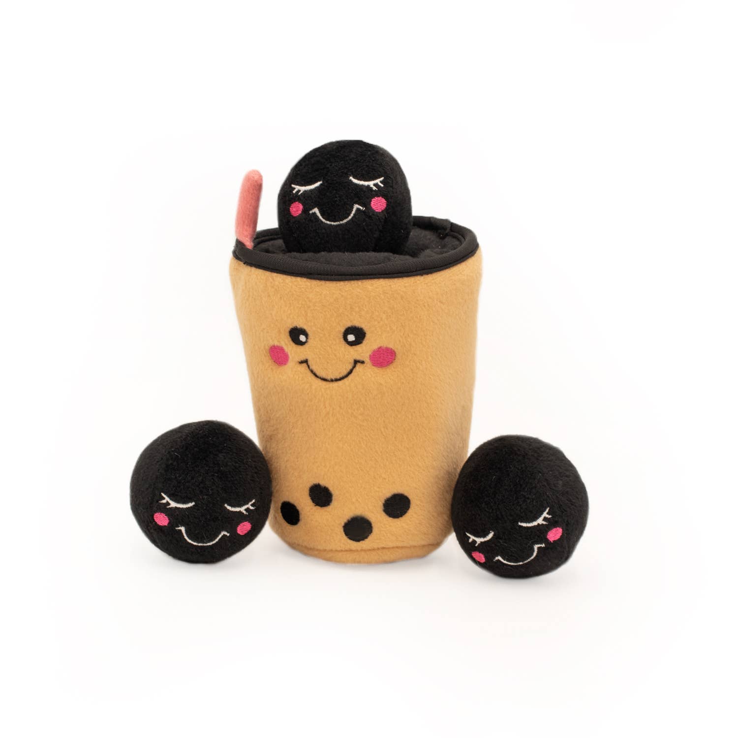 Dog toy made of a boba cup and three black balls on a white background