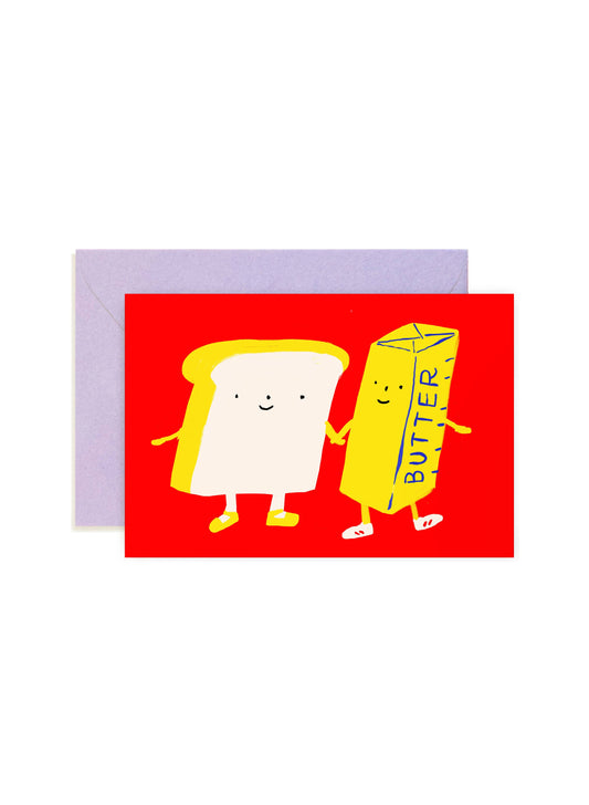 Card with cartoon toast and butter design on a red background