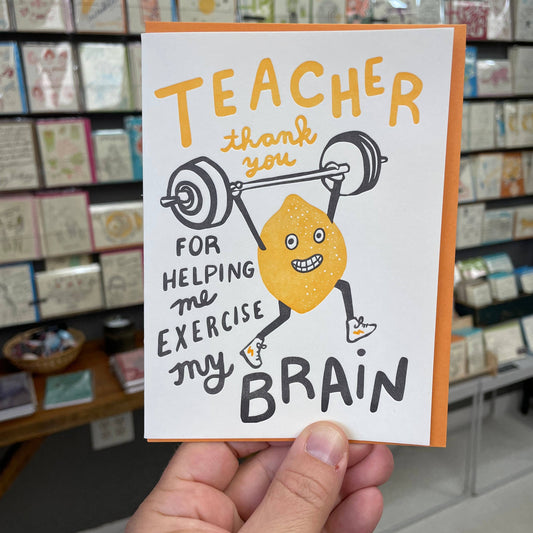 Thank you teacher greeting card -- has a lemon lifting weights and text that reads "Teacher thank you for helping me exercise my brain" 
