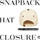 Beige snapback cap on a white background
