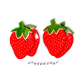 Two red strawberry trinket dishes  with green leaves on a white background, accompanied by the word 'STRAWBERRY'.