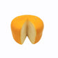 Candle that looks like a wheel of pecorino cheese. Has a wedge cut out of the wheel with two wicks on top -- one on far right and the other far left. 