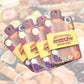 Set of charcuterie board-themed memo pads with a blurred background