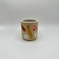 Cheese & Charcuterie Tumbler has an assortment of cheeses, meats and baguettes in various shapes, sizes and cuts.