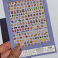 boomerang video of someone holding the sheet of charcuterie themed nail art stickers 