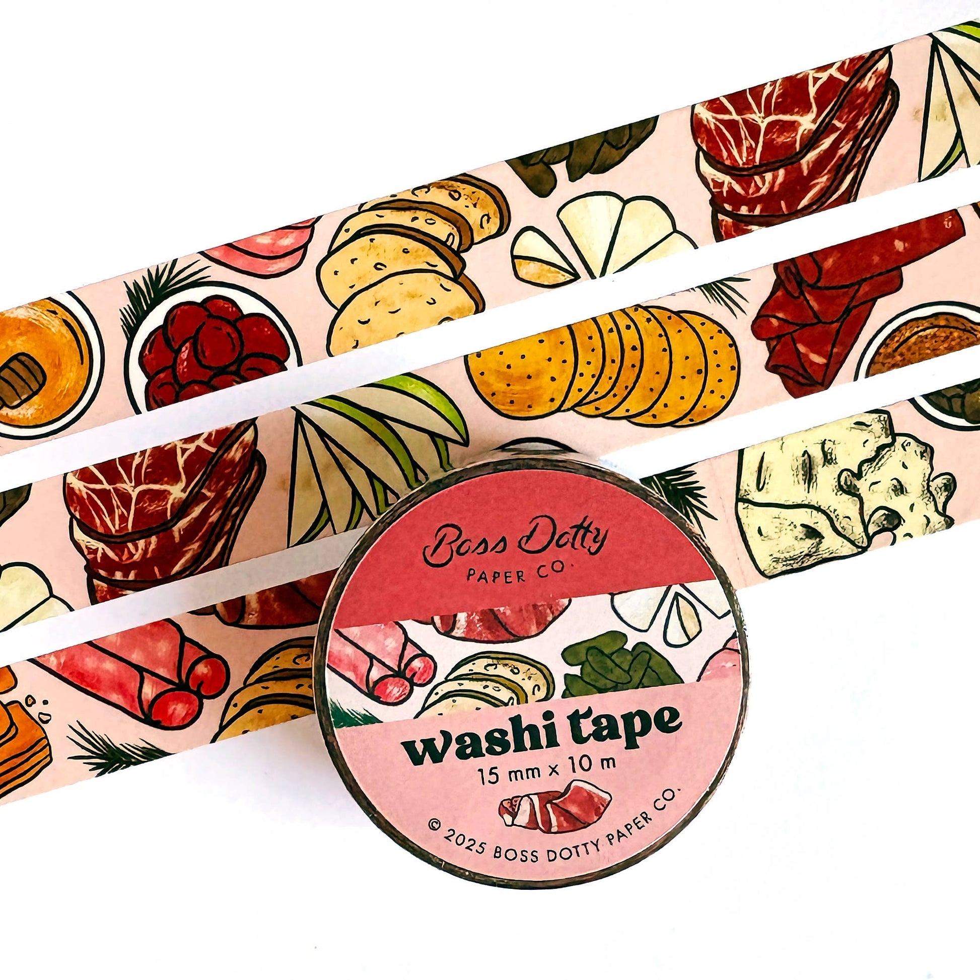 Washi tape that features a repeating pattern of cheese, charcuterie and accoutrements