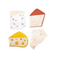 Four cheese-shaped cloth cocktail napkins on a white background