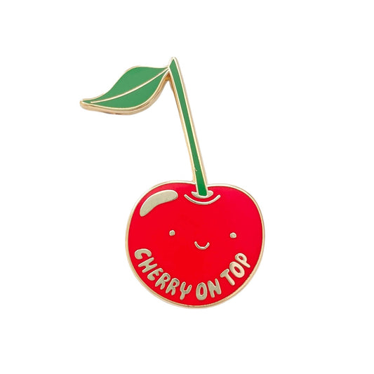 Cherry-shaped pin with 'Cherry on Top' text on a white background