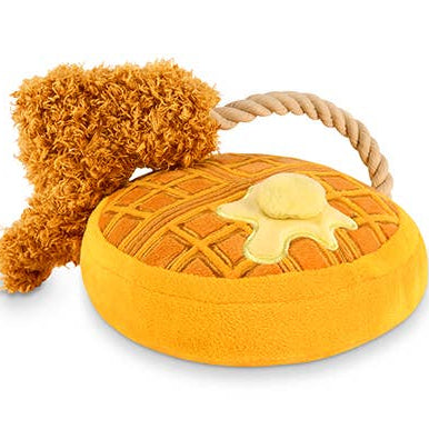 Yellow plush toy with a brown fried chicken attached to a rope on a white background