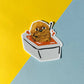 Illustration of a fried chicken nugget dipped in sauce on a yellow and blue background