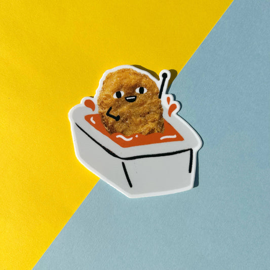 Illustration of a fried chicken nugget dipped in sauce on a yellow and blue background