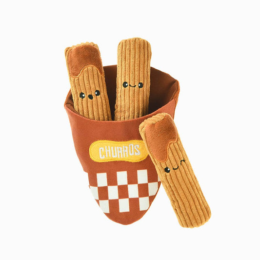 Plush churros dog toy featuring a container labeled 'Churros' with 3 individual churro toys on a white background