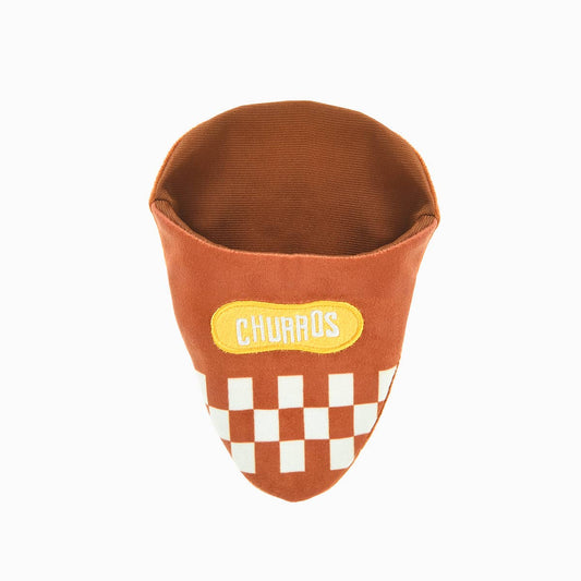 Plush toy brown cup holder for churros with yellow label and checkered pattern on a white background