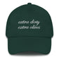 Green hat with script text that reads: extra dirty extra olives