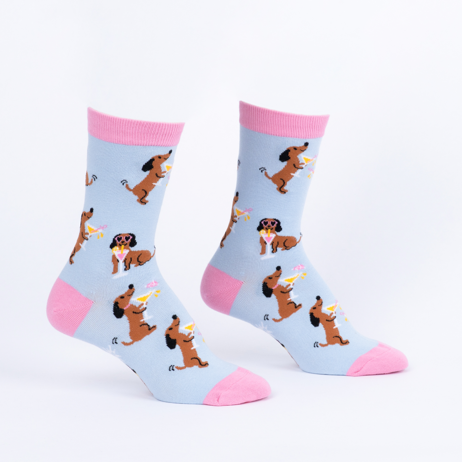 pink and blue socks with a dog holding a cocktail and wearing sunglasses 