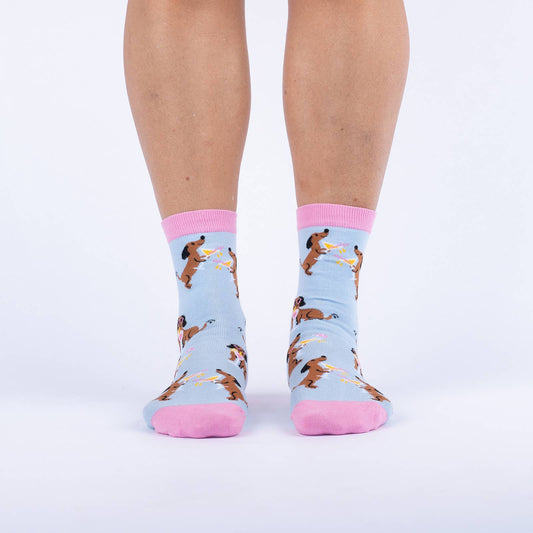 pink and blue socks with a dog holding a cocktail and wearing sunglasses 